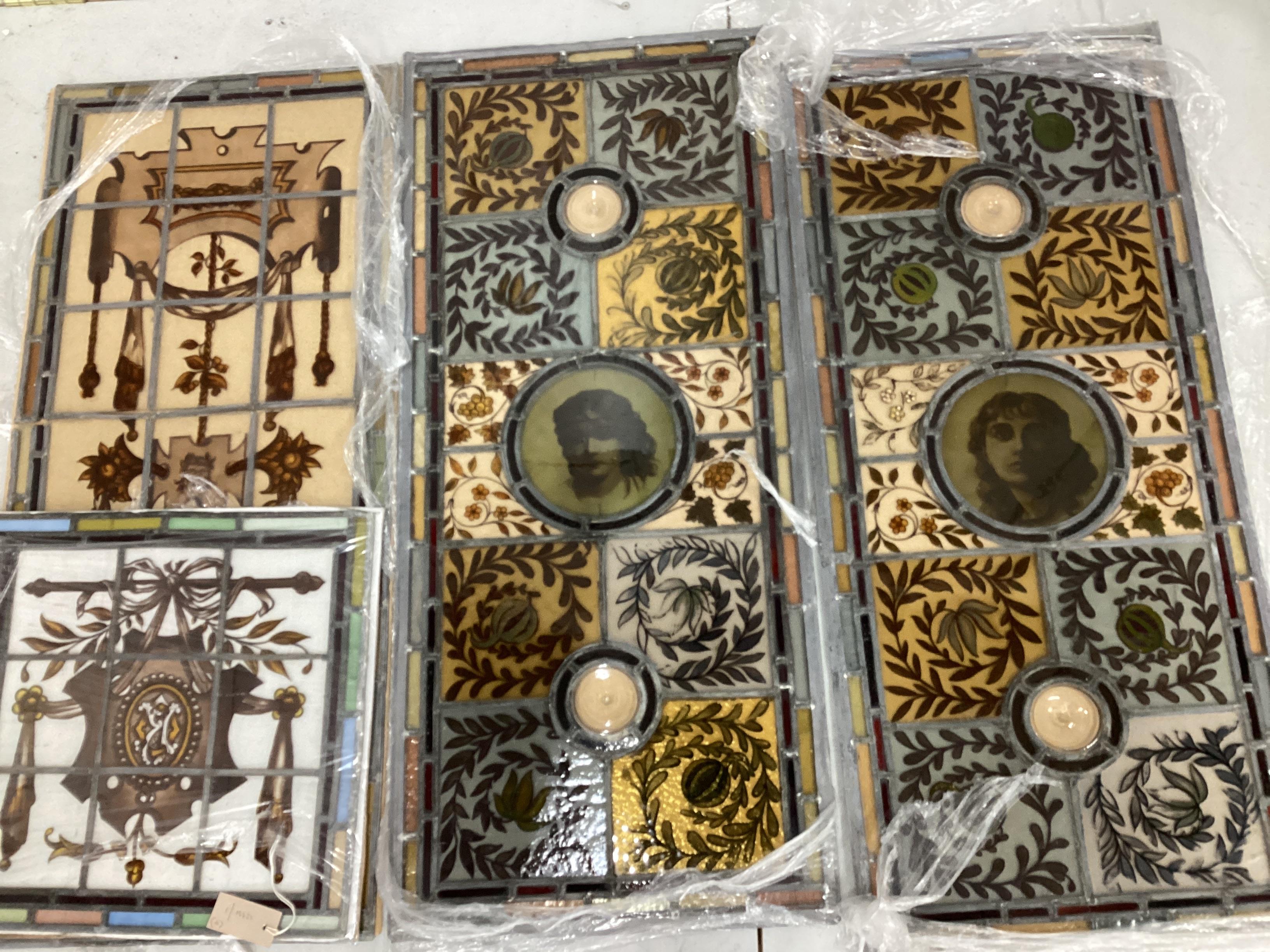Four late Victorian stained glass panels, largest 100 x 50cm